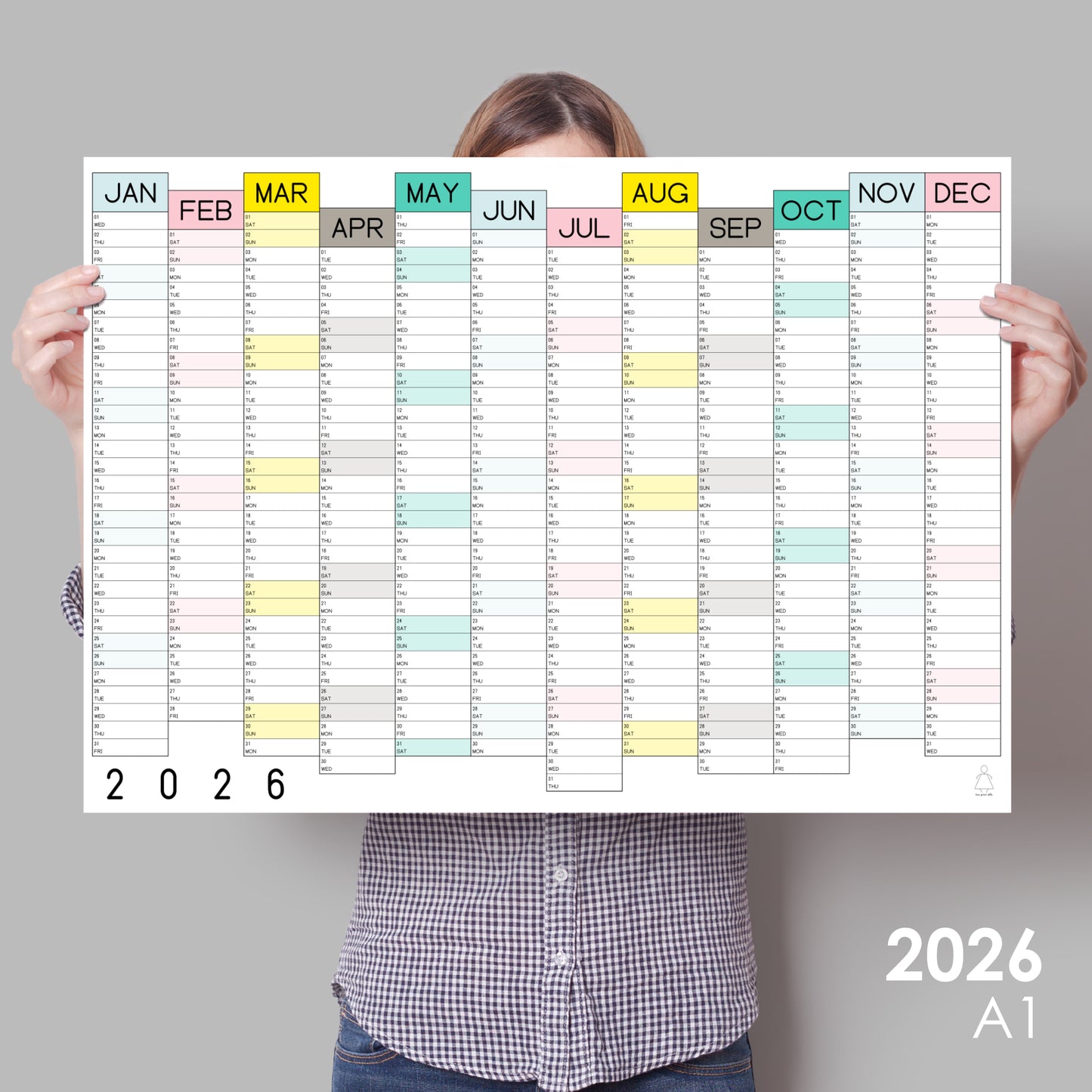 lady holding colourful wall calendar