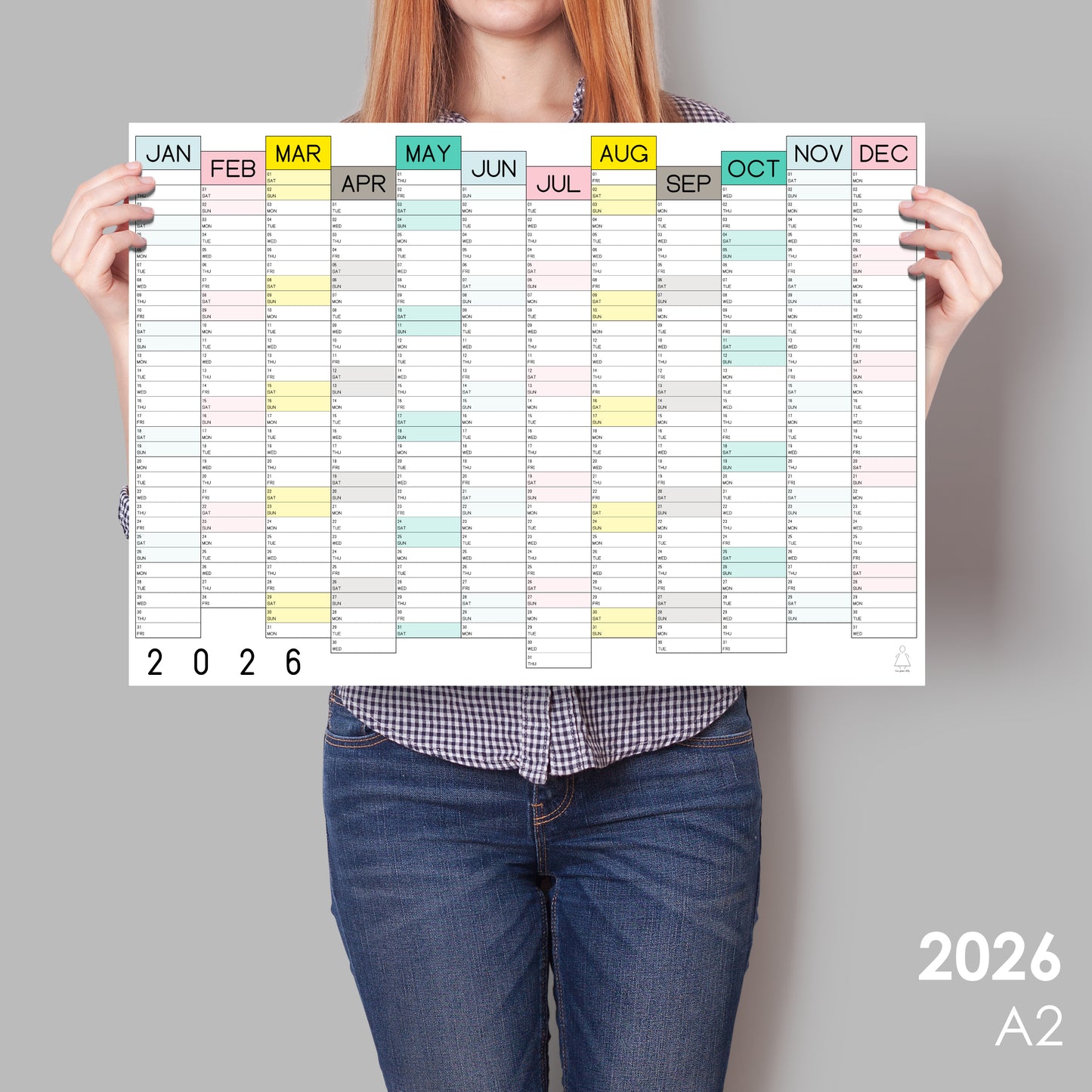 lady holding colourful wall calendar