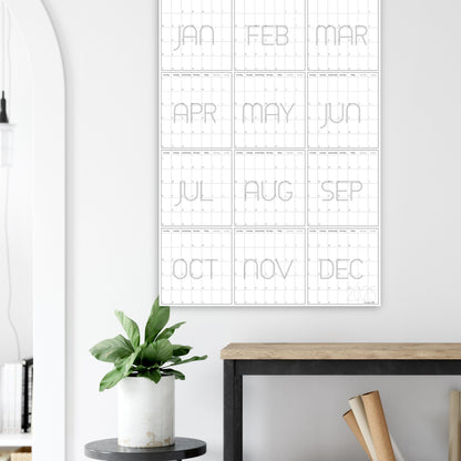 giant calendar on wall above bench