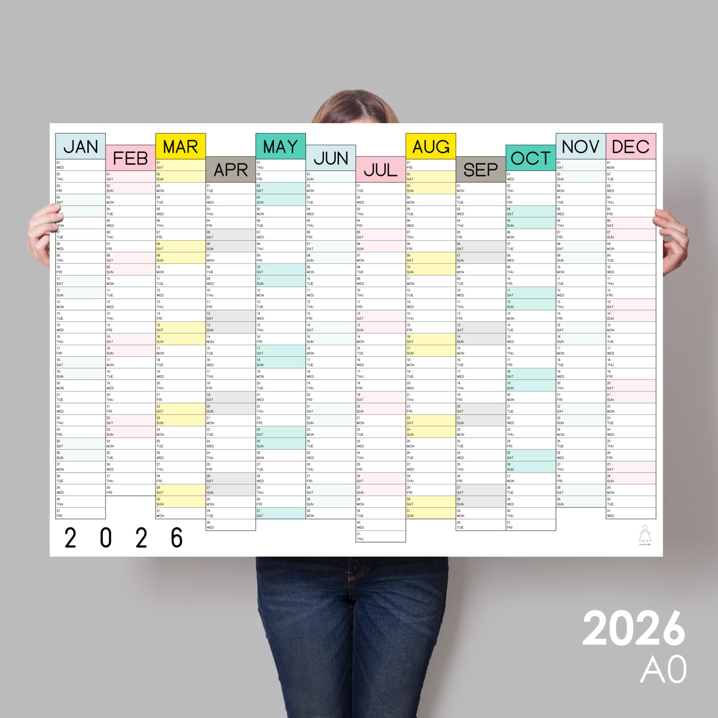 lady holding colourful large wall calendar 