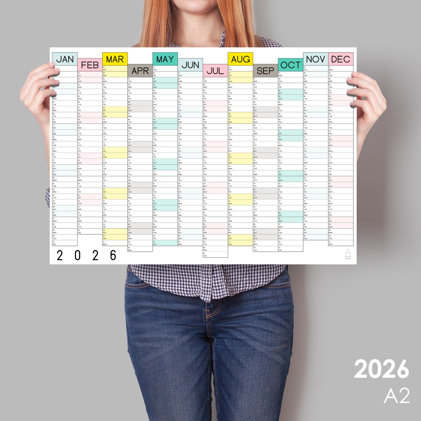 lady holding colourful wall calendar 