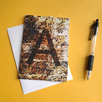 brown greeting card featuring the letter A