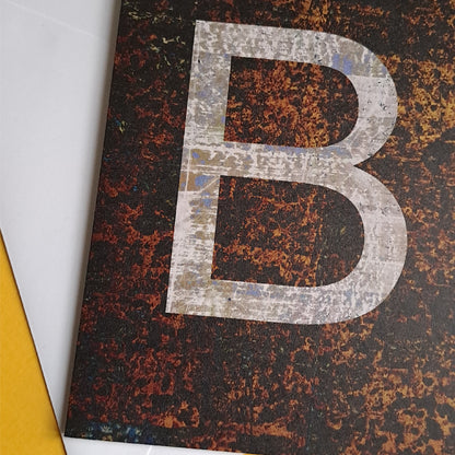 brown greeting card featuring the letter B